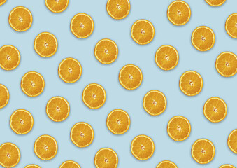 Poster - Orange slices on the light blue background - perfect for a wallpaper