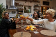 © Mhandy/Creative Flame - Black girlfriends toast to strong friendship connections