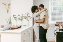 Black Couple Dancing In Kitchen At Home, Intimate Moment
