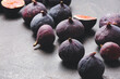 Fresh ripe figs on dark background