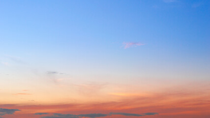 Wall Mural - beautiful sky painted by the sun leaving bright golden shades.dense clouds in twilight sky in winter