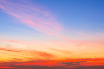 Wall Mural - beautiful sky painted by the sun leaving bright golden shades.dense clouds in twilight sky in winter