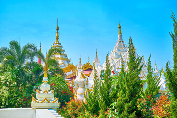 Wall Mural - The pagodas with carved decorations in Mandalay, Myanmar