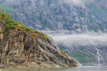 Sticker - USA, Alaska, Glacier Bay National Park. Waterfall on mountain slope.