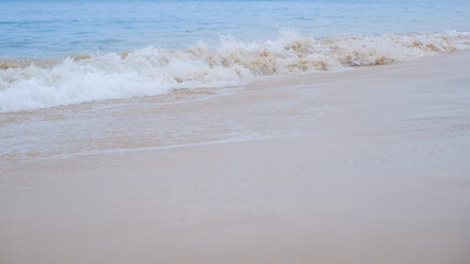 Soft wave on beach. Selective focus. wallpaper and background texture.