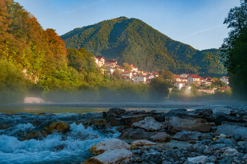 Poster - Village and river in the mountain valley.