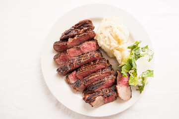 Poster - ribeye steak dinner with mashed and caesar