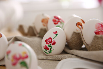 Wall Mural - Beautifully painted Easter eggs on table indoors