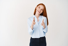 Redhead Female Hr Manager Pointing Fingers At Camera, Smiling Happy, Congratulate You, Standing Over White Background