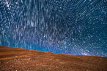 Wall Mural - an amazing view of the milky way rising in atacama desert night sky while the moon sets. an awe view
