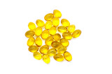 Fototapeta Tulipany - Close up vitamin D3 gel capsules on white background