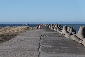 Wall Mural - Port mole in cold spring day in Liepaja, Latvia.