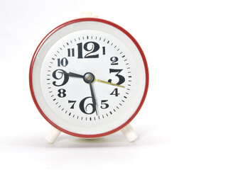 round clock - alarm clock on white background