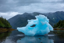 USA, Alaska, Petersburg, Large Iceberg From LeConte Glacier Grounded At Low Tide In LeConte Bay On Summer Evening