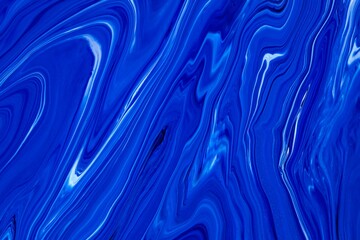 Wall Mural - Fluid art texture. Abstract backdrop with iridescent paint effect. Liquid acrylic picture with chaotic mixed paints. Classic blue color of the year 2020. Blue and white overflowing colors