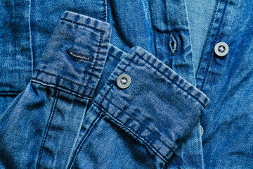 Blue denim clothing top view background