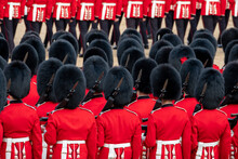 Trooping The Colour, Military Ceremony At Horse Guards Parade, Westminster With The Coldstream Guards In Their Red And Black Traditional Uniform And Bearskin Hats.