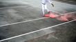 White uniform student playing skateboard trick with pink smoke on board. Copy space. Banner.