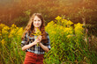 © mashiki - preteen 11 years old kid girl walking on summer countryside road, enjoying vacations outdoor