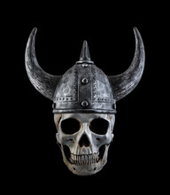 Human Skull With Viking Horned Helmet Isolated On Black