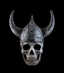 Human skull with viking horned helmet isolated on black