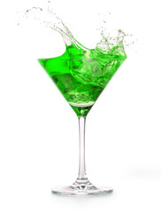 green cocktail splashing into a martini glass isolated on white background