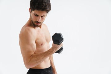 Wall Mural - Half-naked athletic sportsman working out with dumbbell