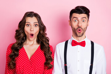 Wall Mural - Portrait of nice excited crazy brown hair couple she wear dress he shirt isolated on pastel pink color background