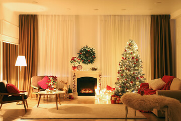 Poster - Beautiful living room interior with burning fireplace and Christmas tree in evening