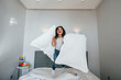© standret - Happy young little girl have fun by jumping on the bed at home