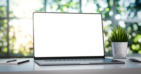 Poster - Laptop with blank frameless screen mockup template on the table in industrial office loft interior - perspective view