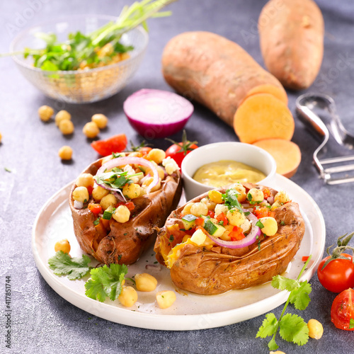 baked sweet potato with vegetable and sauce © M.studio