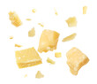 Pieces of delicious parmesan cheese flying on white background