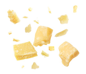 Pieces of delicious parmesan cheese flying on white background