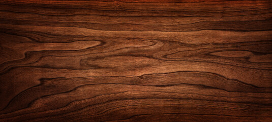 walnut tree texture close up. wide walnut wood texture background. walnut veneer is used in luxury f