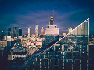 Wall Mural - Beautiful panoramic aerial drone skyline view of the Warsaw City Centre with skyscrapers of the Warsaw City and CHMIELNA 89 WARSAW CRYSTAL - a glass pyramid-shaped skyscraper, Poland, EU