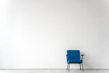 Fototapeta  - Empty room with a blue chair on a white wall background