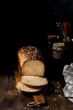 Close up of homemade whole grain sourdough bread on dark background