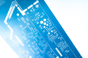 Poster - White and blue PCB background. Radio-electronic components. Production of printed circuit boards. Place for text.