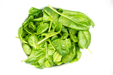 Wall Mural - Young spinach in bowl isolated on white background top view