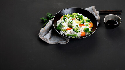 Wall Mural - Healthy vegan rice with boiled broccoli, carrot and spring onion