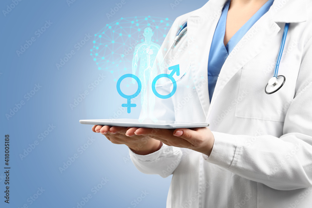 Female gynecologist with tablet computer on color background. Concept of sexual health - obrazy, fototapety, plakaty 
