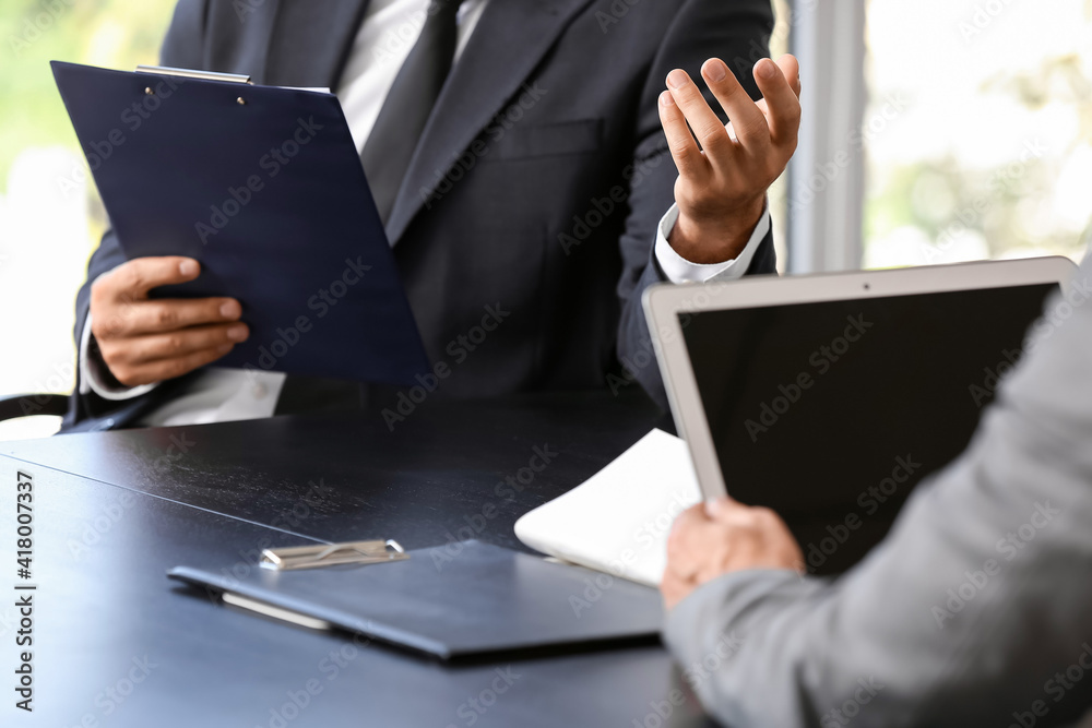 Young businessmen working in office