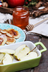 Sticker - Traditional apple fritters on the plate.