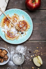 Wall Mural - Traditional apple fritters on the plate.