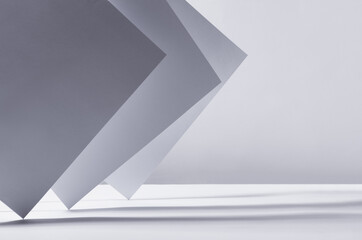 Poster - abstract white grey minimalist background with asymmetric standing sheets with perspective, light an