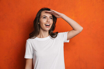 Sticker - Happy beautiful brunette girl smiling and looking upward