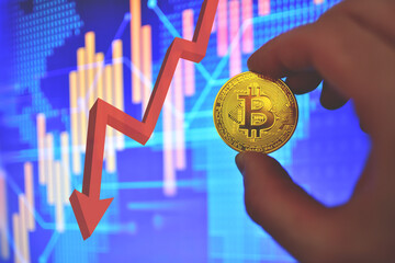 Bitcoin coin on background of cryptocurrency trading exchange chart. BTC mining and investing concept. Blockchain and financial technology. Crypto prices and charts, listed by market capitalization