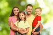© New Africa - Happy family with children outdoors on sunny day