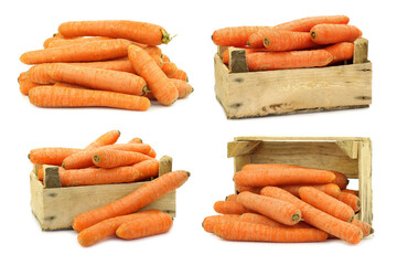 Wall Mural - fresh winter carrots in a wooden crate on a white background